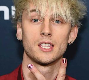 Machine Gun Kelly showcases bold evil eye nailart